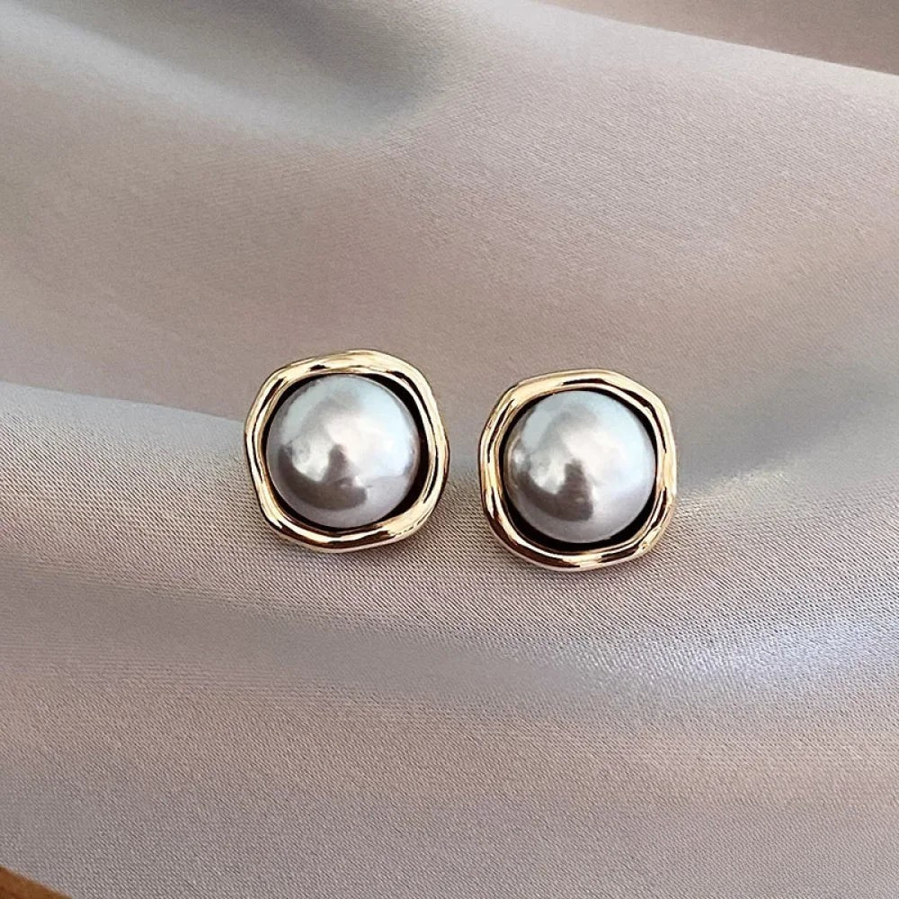 Boucles d'oreilles élégantes en perle noire
